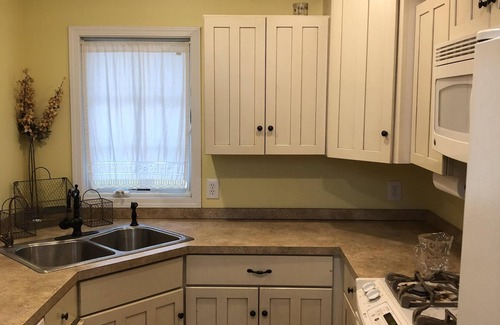 Goodrich House | Cozy, Comfortable, Swiss Chalet on Big Fish Lake