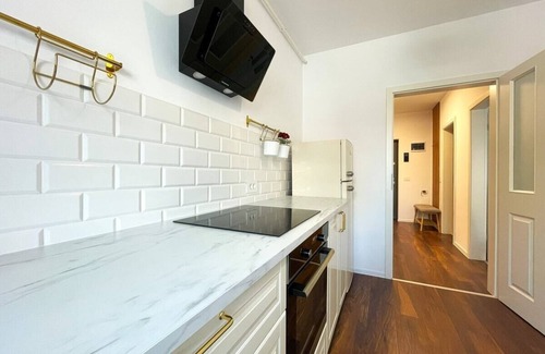 Tractorul Apartment | Cozy Corner Apartment: Baby Crib and High Chair