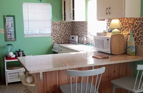 Kiska Beach House | Cozy Cottage on quiet end of Panama City Beach. Just steps from sand and surf!