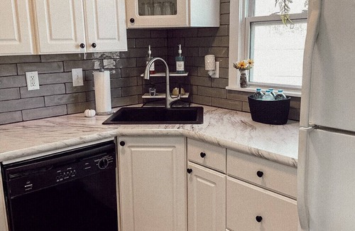 Liberty Cottage | Cozy cottage with fire pit in safe area with easy access to Kansas City!
