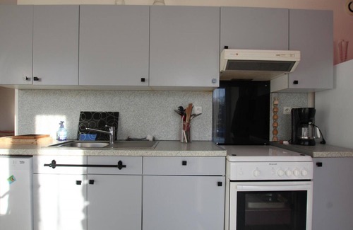 Angoville-sur-Ay Cottage | Cozy Duplex with Terrace, BBQ, and Stunning Countryside Views