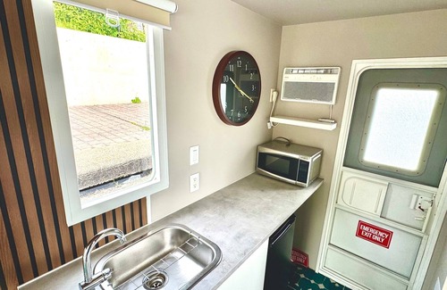 Medina Boat Rental | Cozy Erie Canal Houseboat in the Heart of Bustling Downtown Medina