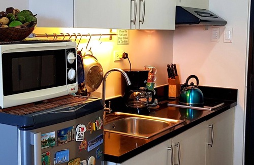 Valencia Condo | Cozy fully furnished deluxe studio condominium Excellent Location
