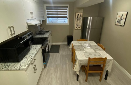 Airdrie Apartment | Cozy,furnished 2 bedroom basement apartment with a kitchen and 1 bathroom/shower