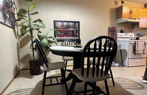 Taber House | Cozy Getaway: 2-Story Bungalow in Taber: Old-Fashioned Charm with big trees.