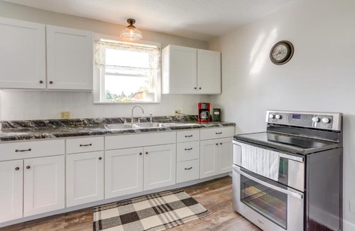 New Haven Huron County House | Cozy Greenwich Vacation Rental with Fire Pit
