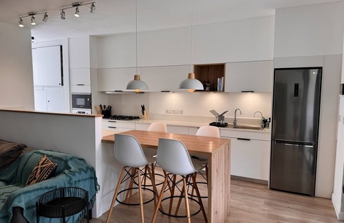 Albion Apartment | Cozy Grin: Club Med beach access, private garden, modern comfort.