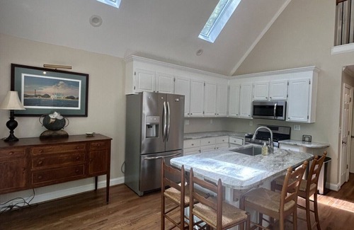 Henderson House | Cozy Kerr Lake waterfront home with private boat dock.