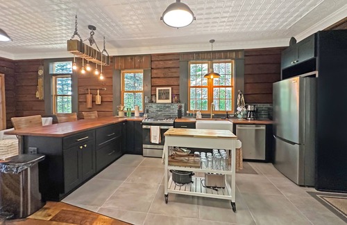 Aitkin House | Cozy Lake Cabin in Restored 1894 Schoolhouse—Perfect Escape.