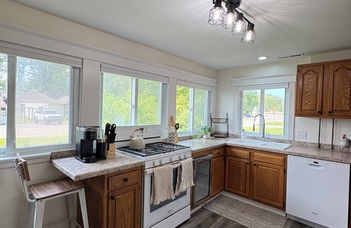Brighton House | Cozy Lake Escape with Dock, Firepit, & Fenced Yard