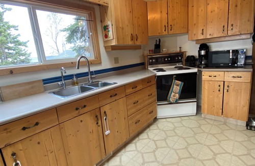 Christopher Lake House | Cozy lake-front A-frame cabin at Emma Lake. Steps away from the beach!