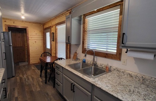 Gilmer Cabin | Cozy Lakefront 2-bedroom cabin in tranquil Big Sandy, TX.