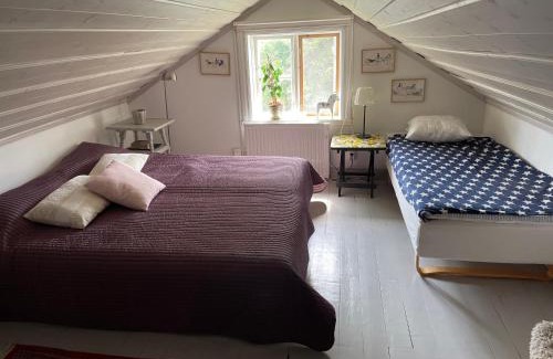 Holo House | Cozy lodge at horse farm with lake and sauna