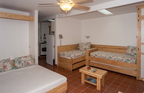 Crown Point Resort | Cozy loft in Tropical Paradise within walking distance to the beach!
