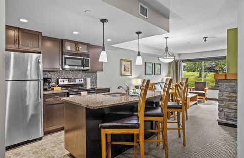 Dead Man's Flats Apartment | Cozy Mountain Hideaway, King Bed, hot tub, free parking, Wi-Fi, up to 4 people!