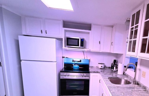 Groton Condo | Cozy Ocean Breeze Retreat in a serene beach community in Groton, CT.