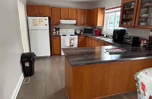 Laurentian Valley House | Cozy Ottawa River Retreat: Festive Decor, Fireplace, & Scenic Views Await