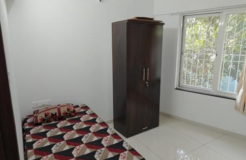 Pune House | Cozy & Premium Homestay Rooms near Bharati Vidyapeeth, Pune