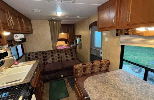 Burton House | Cozy Riverside 2-bedroom RV in Charming Burton Ohio