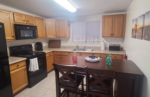 Apache Junction House | Cozy spanish style bungalow; huge private covered patio includes spa and more!