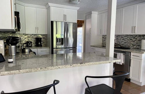 Ludlam House | Cozy Suburban Home with huge backyard and pool! Welcome!