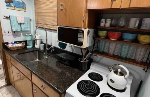 Lake Goodwin House | Cozy Tiny House Style Cabin with Hot Tub on Waterfront