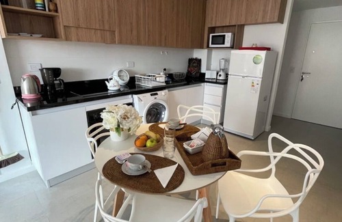 Comuna 7 Apartment | Cozy two-bedroom apartment, excellent location, 24-hour security, pool barbecue.