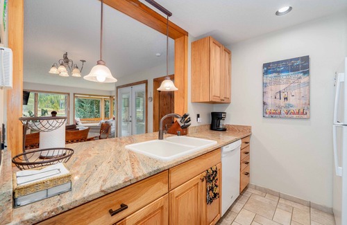 Lakeside Village Condo | Cozy, updated condo with lake views and ski shuttle right out front!