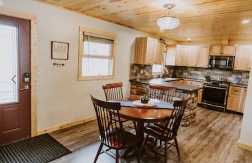 Webster Cabin | Cozy Vacation Cottage on the Lake with Hot Tub!