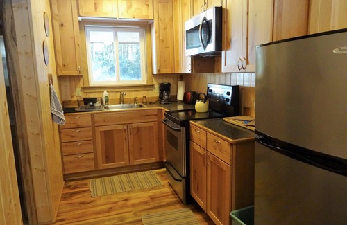 Reedsport Cabin | CozyCattail Cabin on our secluded coastal estuary woodland retreat