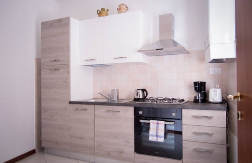 Cisano Apartment | DAISY Apartment - 50 meters from the lake and the beach