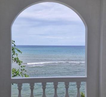 Langowan Resort | De BOUGENVILLE Tulap Beach Front