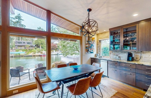 Blue Heron House | Delightful Retreat with Water Views, Fast WiFi, Gas Grill, & Furnished Patio