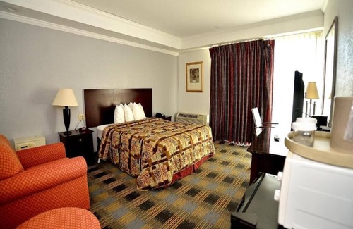 Somerset Hotel | DELUXE ROOM, QUEEN BED