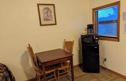 Perry Cabin | Deluxe two queen bed motel room packed with amenities.