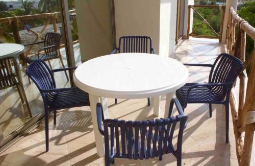 Chicxulub Puerto Apartment | Departamento mar y arena