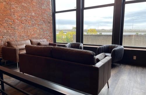 West Main Historic District Apartment | DerbyCity Plush Loft Gather in Style by Hollyhock