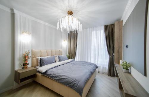 Riscani Apartment | Designer Apartment with 2 Bedrooms, Full Kitchen, Rain Shower & Coffee Station and Netflix - GrandStay