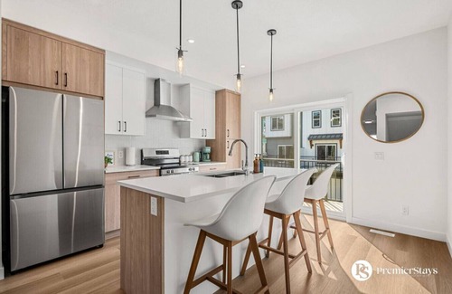Springbank Hill House | Designer-Inspired Home » King Bed » Garage » AC