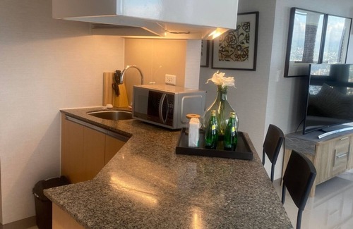 Bagumbayan Condo | Discounted | Classy 2.5BR with Pool and City Skyline View!