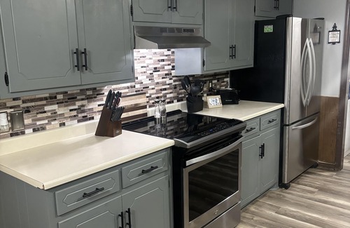 Enid House | Discover Enid - Centrally Located Beautiful Brick Home