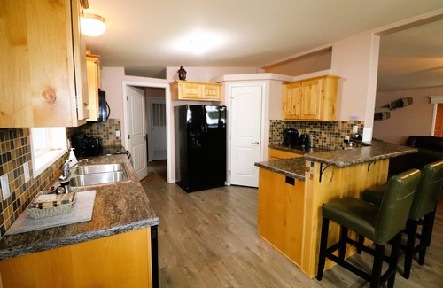 Deka Lake House | Discover Tranquility: Your Own 1-Acre Oasis on the Lakefront