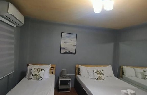 Cabanatuan Apartment | DJCI Apartelle Walk to Robinson & NE Pacific Mall 3 Min to SM Cabanatuan