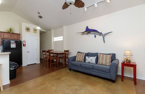 Corpus Christi Cottage | Dog-Friendly home w/Private Fenced Patio, Resort-style Pool, & Close to Beach