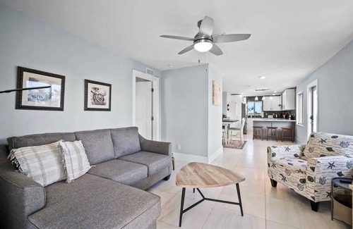 Isles of Capri Condo | Dog-friendly single-level condo with furnished patio, rooftop, & washer/dryer