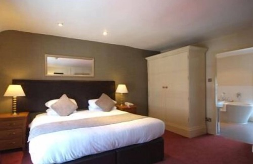 Tutbury Hotel | Dog & Partridge Hotel by Greene King Inns