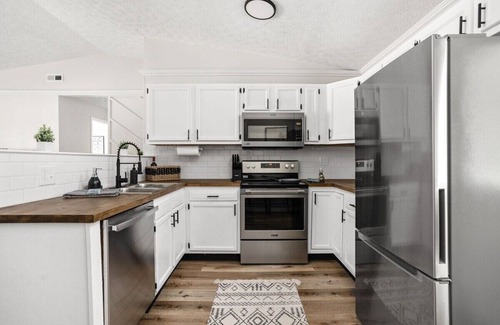 West Newton House | Downtown Access | 3BR Ranch Retreat with Fire-Pit