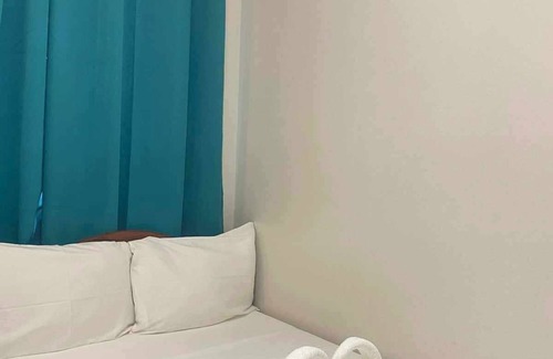 Puerto Princesa City Centre Hotel | Downtown Getaway: Cozy Stay by Miss Sophie's - 3minAirport/1minCapitol/AC/Wifi+