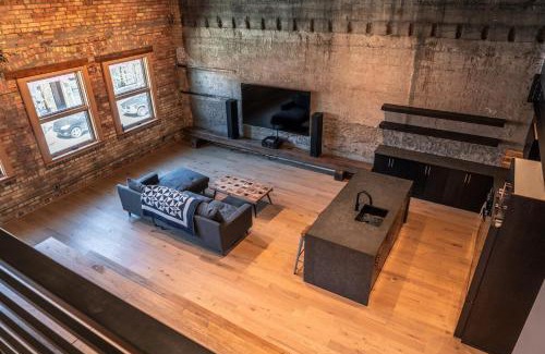 Historic Downtown Fernie Apartment | Downtown Loft with Rooftop Hot Tub by StayIn