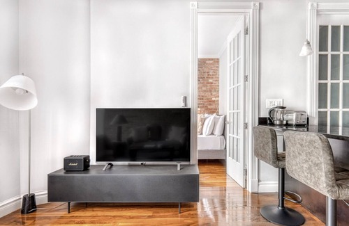Nolita Apartment | Dreamy SoHo 2BR w/W/D & Balcony, nr Whole Foods, by Blueground